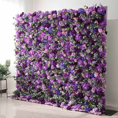 A captivating flower wall predominantly in varying shades of purple, from lilac to deep violet. It&