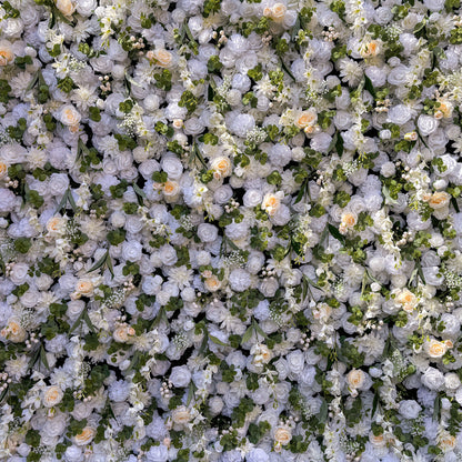 This wedding flower wall is a breathtaking sight. It is densely covered with a variety of white and light - colored flowers, such as roses and peonies. Interspersed among the flowers are lush green leaves and small floral buds, adding texture and depth. The overall effect is romantic and elegant, perfect for a wedding backdrop.