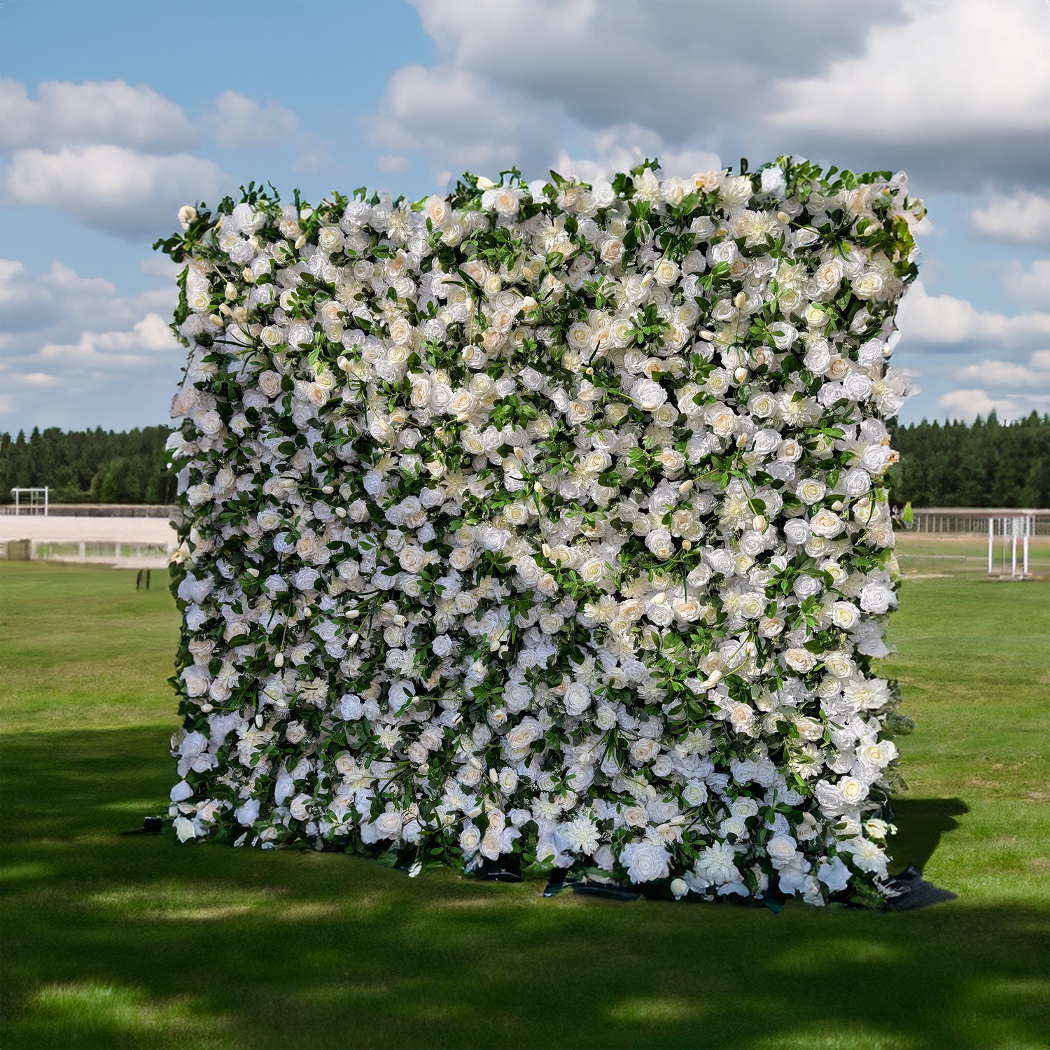 This artificial flower wall is 2.4m x 2.4m. It is filled with numerous white roses and green leaves, looking luxurious. The materials are of high - quality, ensuring durability. It&