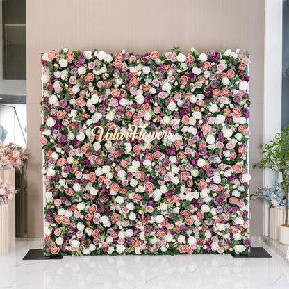 This floral wall boasts a vibrant mix of pink, purple, and white roses. Ideal for events, it adds a romantic and lush backdrop with its rich colors and dense arrangement, enhancing the elegance of any sophisticated setting.
