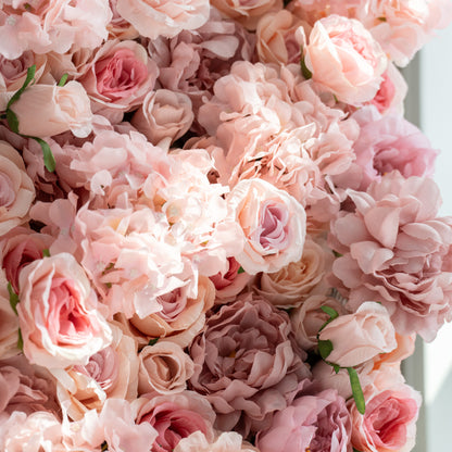 This image showcases a close - up of a floral carpet. The wall is densely packed with large, soft - pink roses, creating a romantic and elegant appearance. The petals are intricately layered, and the overall color scheme is a delicate blend of pastel pinks. This type of floral wall is often used for decorative purposes in events like weddings, parties, or photo shoots.