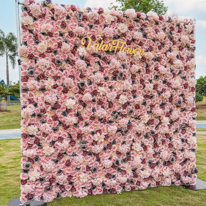 Blush Blossom Tapestry: An exquisite floral backdrop brimming with layers of soft pink and creamy white roses. Amidst the gentle petals, the golden &quot;VlairFlowers&quot; inscription gleams, set against a scenic city park. An embodiment of romance and elegance in nature&