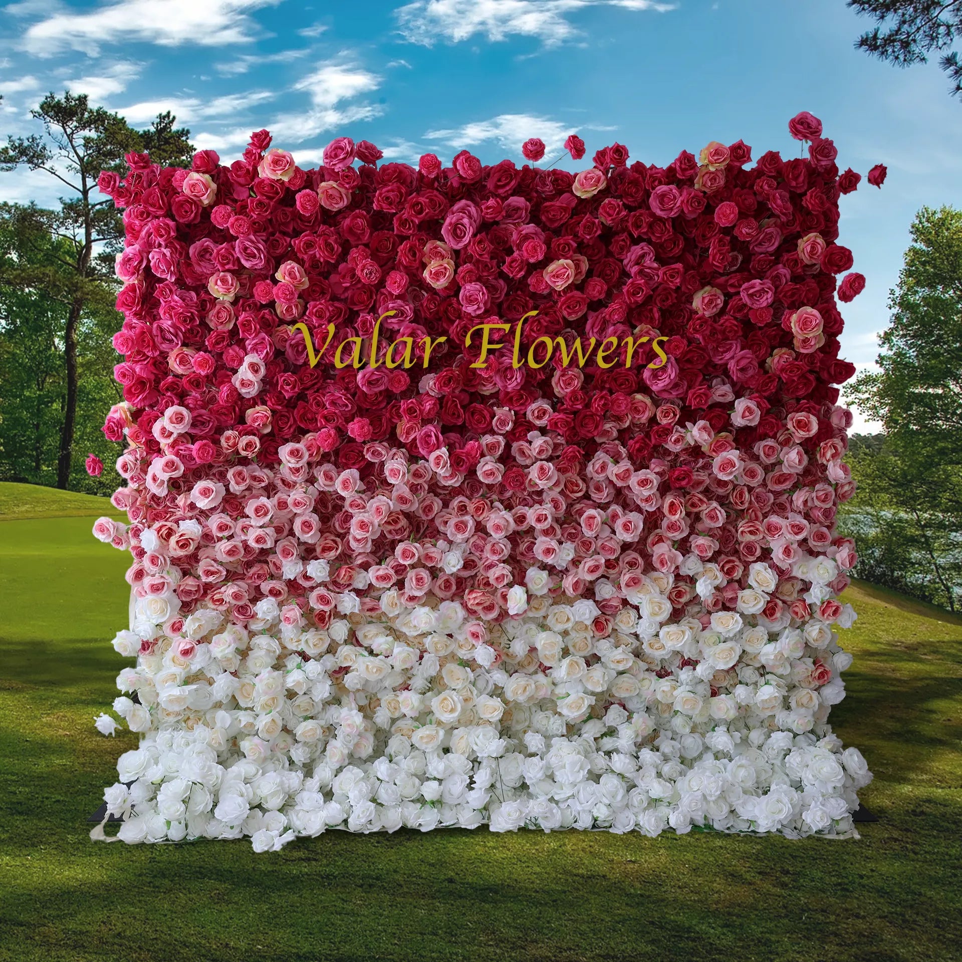 This artificial flower wall is a stunning decor option. It features a gradient of pink to white roses, is easy to install, customizable in size, durable, and suitable for various events like weddings and parties.