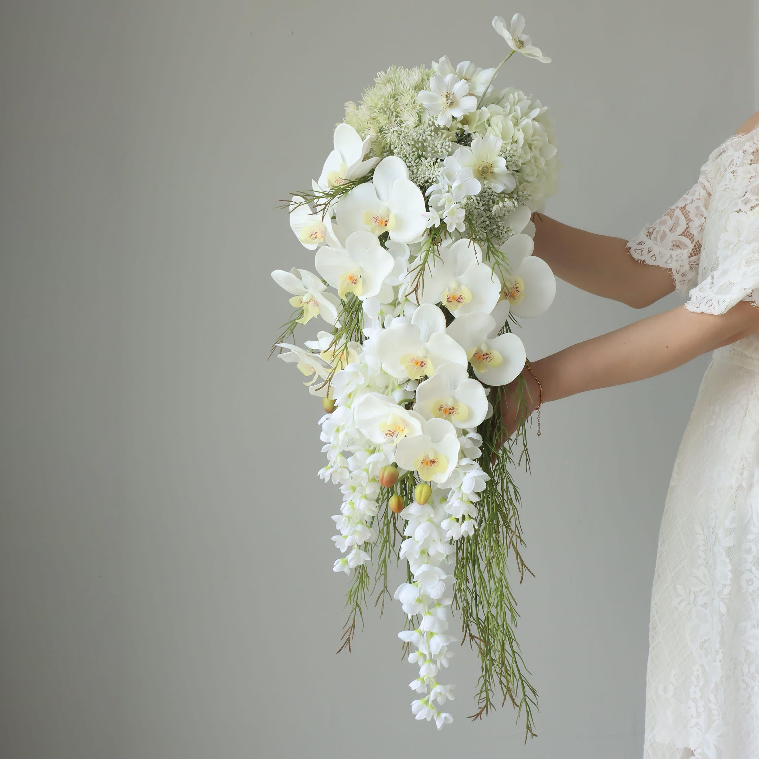 Elegant Cascading Bridal Bouquet with White Orchids and Greenery - High-Quality Artificial Flowers for Weddings and Special Occasions, Sophisticated Design and Lasting Beauty